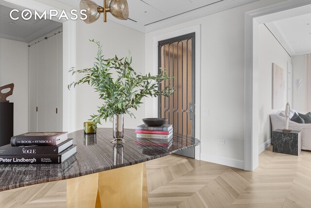 entryway with parquet floors