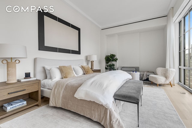 bedroom with wood finished floors