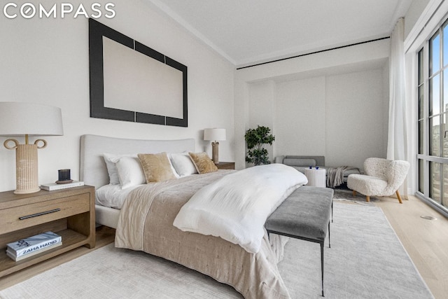 bedroom featuring hardwood / wood-style flooring