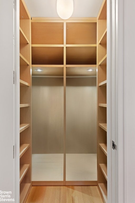 hallway featuring light hardwood / wood-style flooring