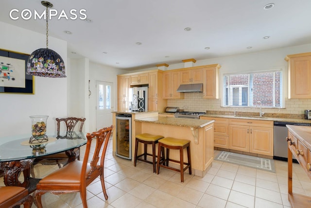 139 82nd St, New York City, NY 11209 - kitchen with dishwasher, beverage cooler, light brown cabinets, tasteful backsplash, and a kitchen island
