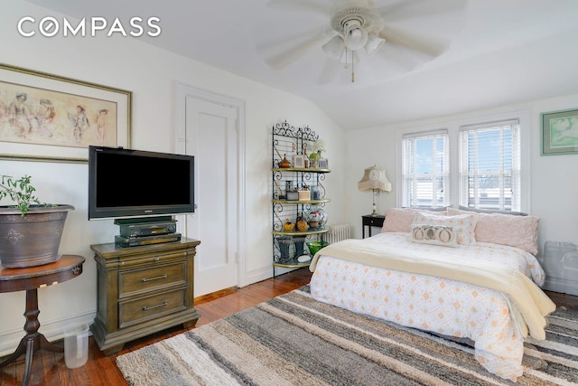 139 82nd St, New York City, NY 11209 - bedroom with wood finished floors, vaulted ceiling, ceiling fan, and radiator