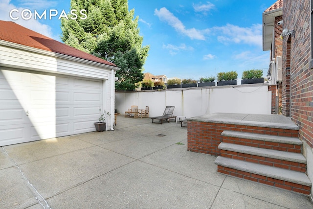 139 82nd St, New York City, NY 11209 - view of patio / terrace with a garage