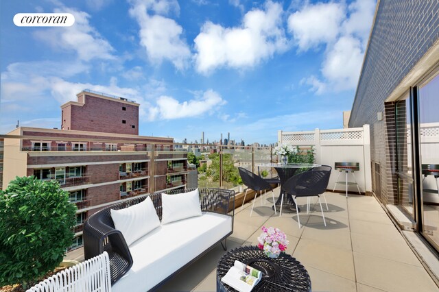 21-17 31st Ave Phe, Phe, New York City, NY 11106 - balcony featuring an outdoor hangout area and a view of city