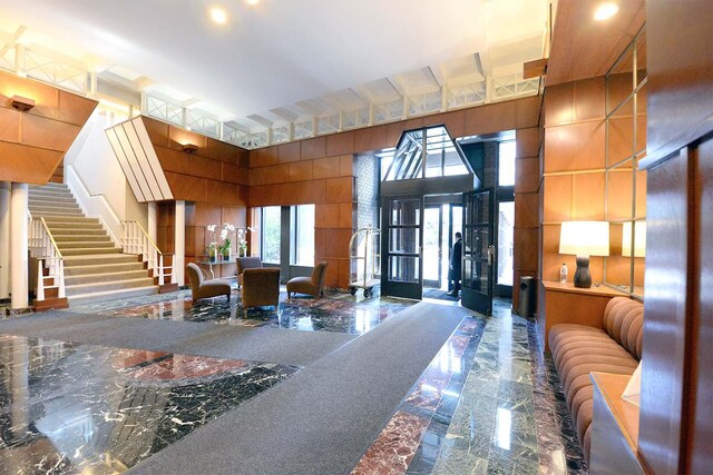 188 E 64th St Unit 1702, New York City, NY 10065 - lobby with stairway