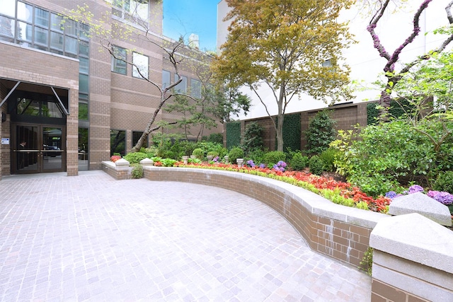 188 E 64th St Unit 1702, New York City, NY 10065 - surrounding community with a patio area