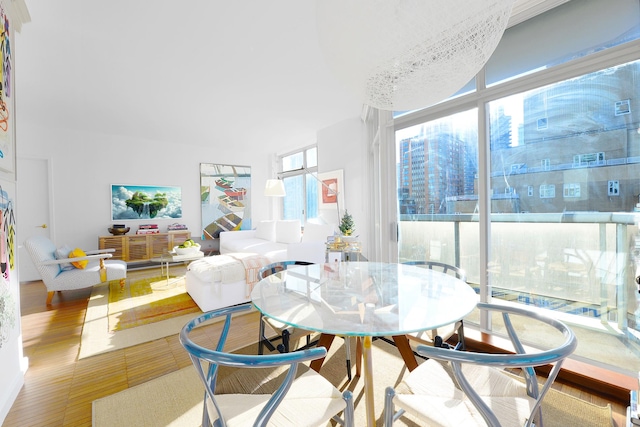 dining area featuring floor to ceiling windows