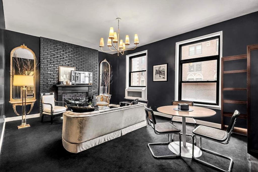 55 E 65th St Unit 7D, New York City, NY 10065 - office area featuring a chandelier and baseboards