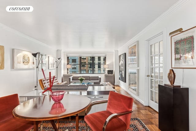 dining area with parquet flooring, french doors, and ornamental molding