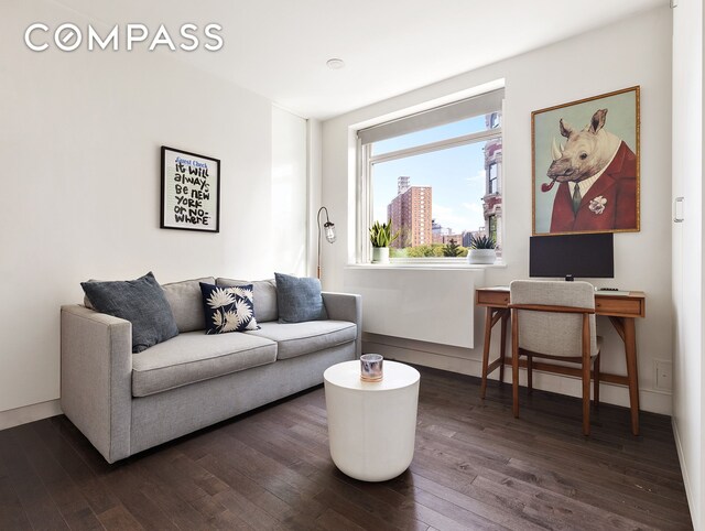 living room with dark wood-type flooring