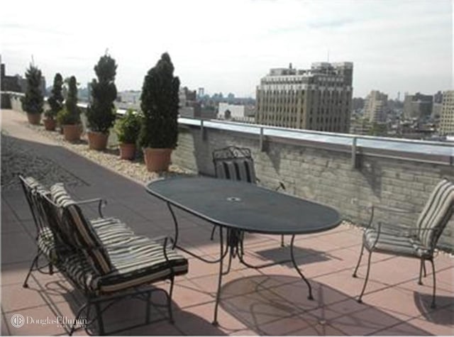 view of patio featuring a view of city