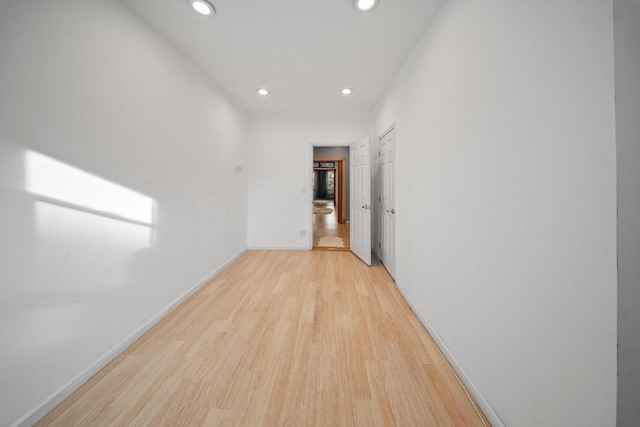 corridor featuring light hardwood / wood-style flooring