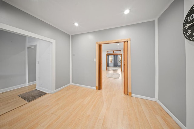 hall with light hardwood / wood-style floors