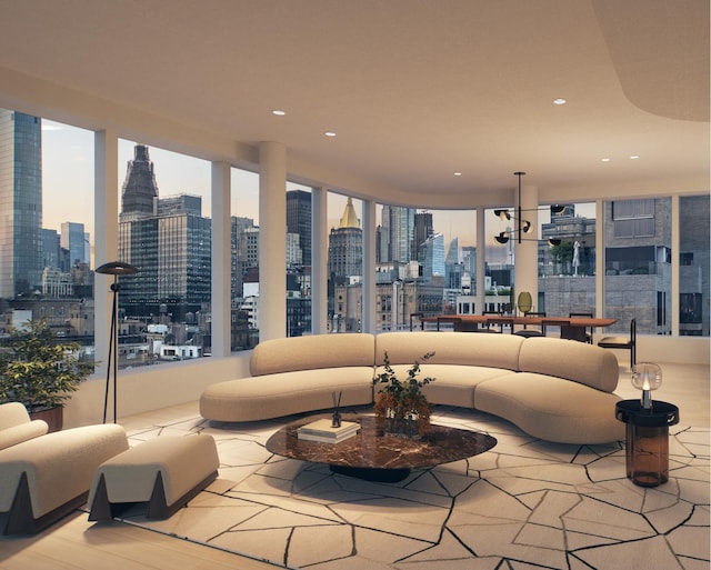 living room with a city view and recessed lighting