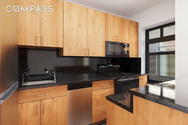 kitchen with dark stone countertops, sink, black appliances, and decorative backsplash