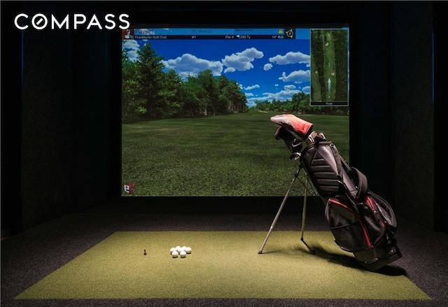 50 W St Unit 14B, New York City, NY 10006 - playroom with golf simulator and carpet floors