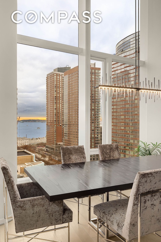 50 W St Unit 14B, New York City, NY 10006 - balcony with a water view and outdoor dining space