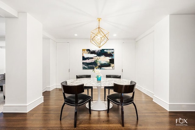 dining room with a chandelier, baseboards, dark wood finished floors, and recessed lighting