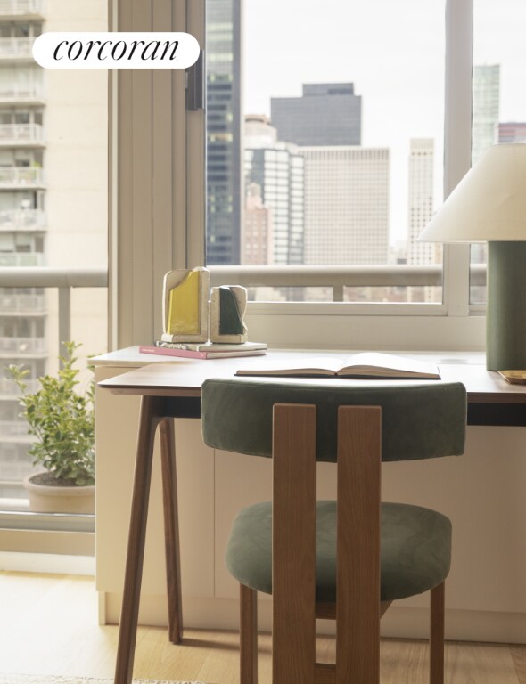 workout area with hardwood / wood-style floors and a wealth of natural light