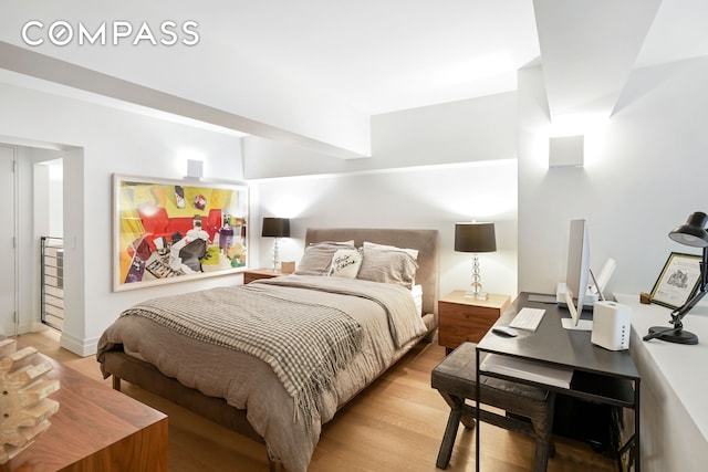 bedroom featuring light wood finished floors