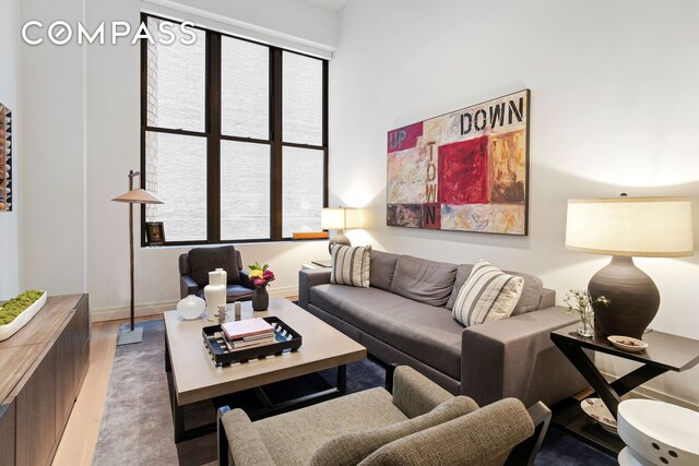 421 Hudson St Unit 221, New York City, NY 10014 - living room with wood finished floors and baseboards