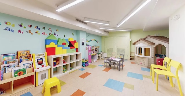 playroom with visible vents and tile patterned floors