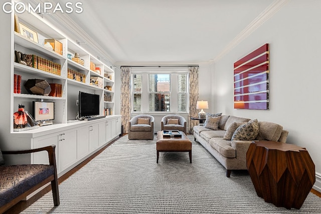 living room with wood-type flooring and crown molding