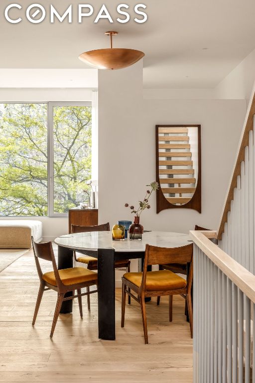 dining space featuring light hardwood / wood-style flooring