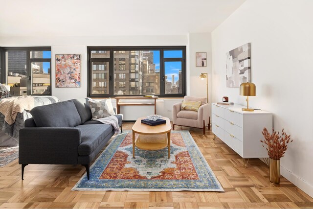 living room featuring light parquet floors