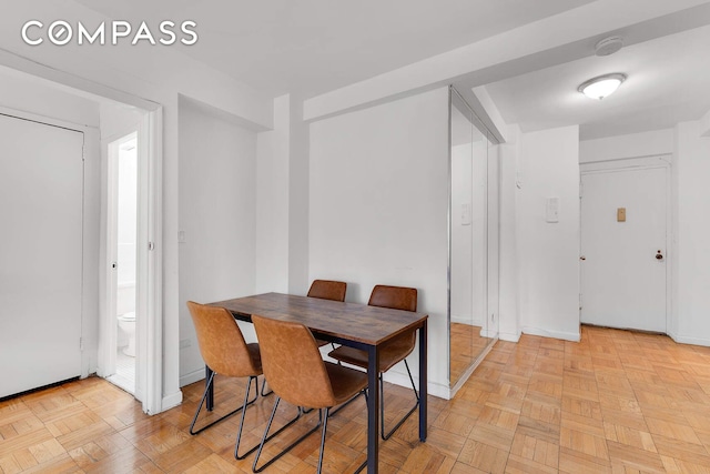 dining room with baseboards