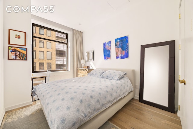 181 Hudson St Unit 2B, New York City, NY 10013 - bedroom featuring light wood-style flooring and baseboards