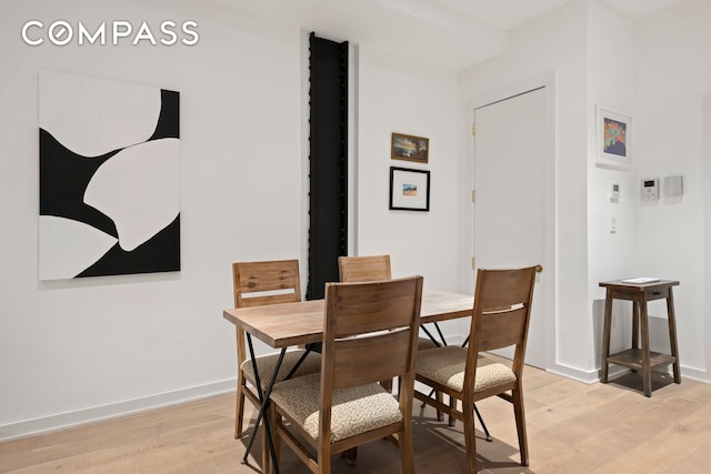 181 Hudson St Unit 2B, New York City, NY 10013 - dining room featuring light wood-style flooring and baseboards