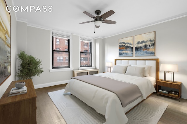 321 E 54th St Unit 10B, New York City, NY 10022 - bedroom with ornamental molding, wood finished floors, and ceiling fan