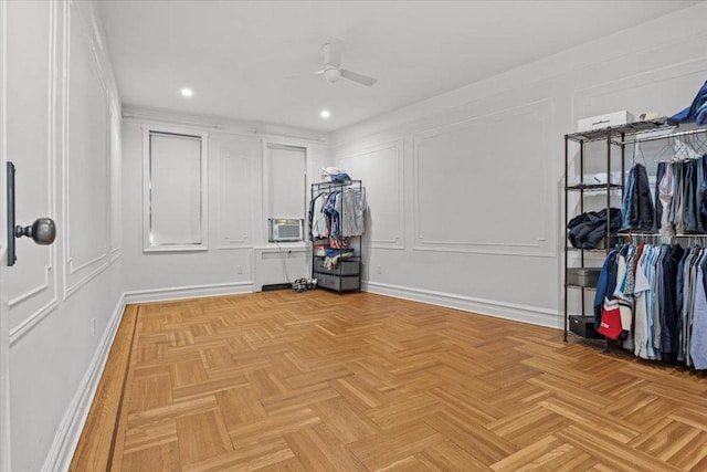 spacious closet featuring ceiling fan