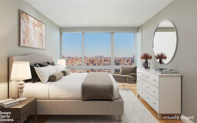 bedroom with a city view