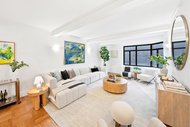 25 W 54th St Unit 8F, New York City, NY 10019 - living room featuring beam ceiling and baseboards