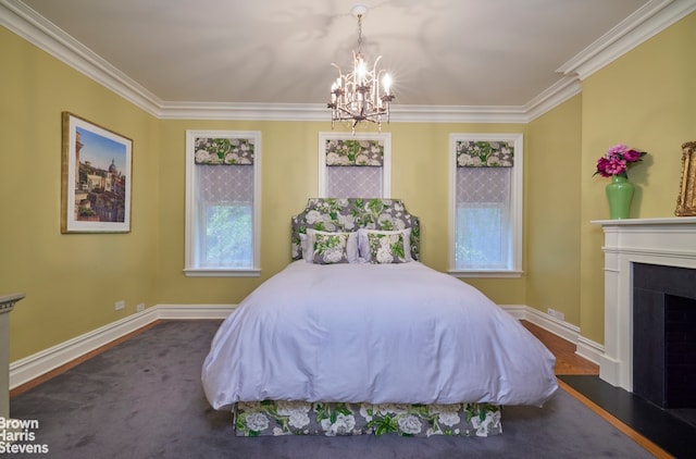 bedroom featuring crown molding, a fireplace, and baseboards