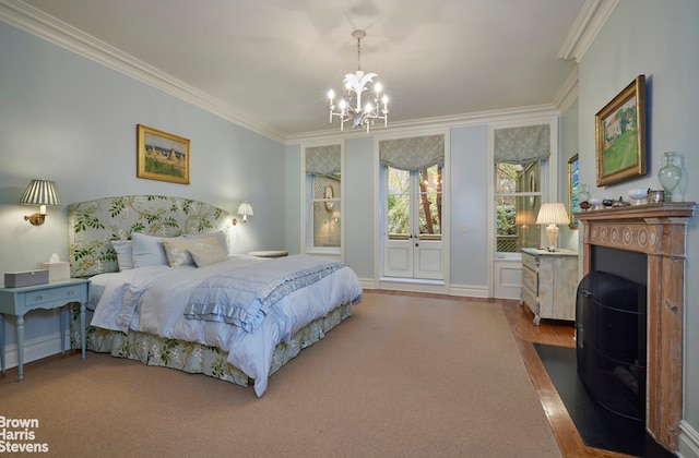 bedroom with a chandelier, ornamental molding, a fireplace with flush hearth, and baseboards