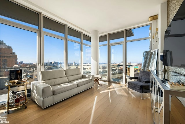 sunroom / solarium with a city view