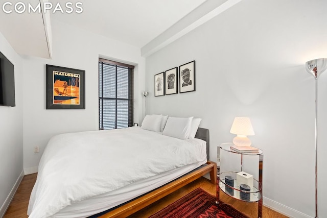 bedroom featuring hardwood / wood-style flooring