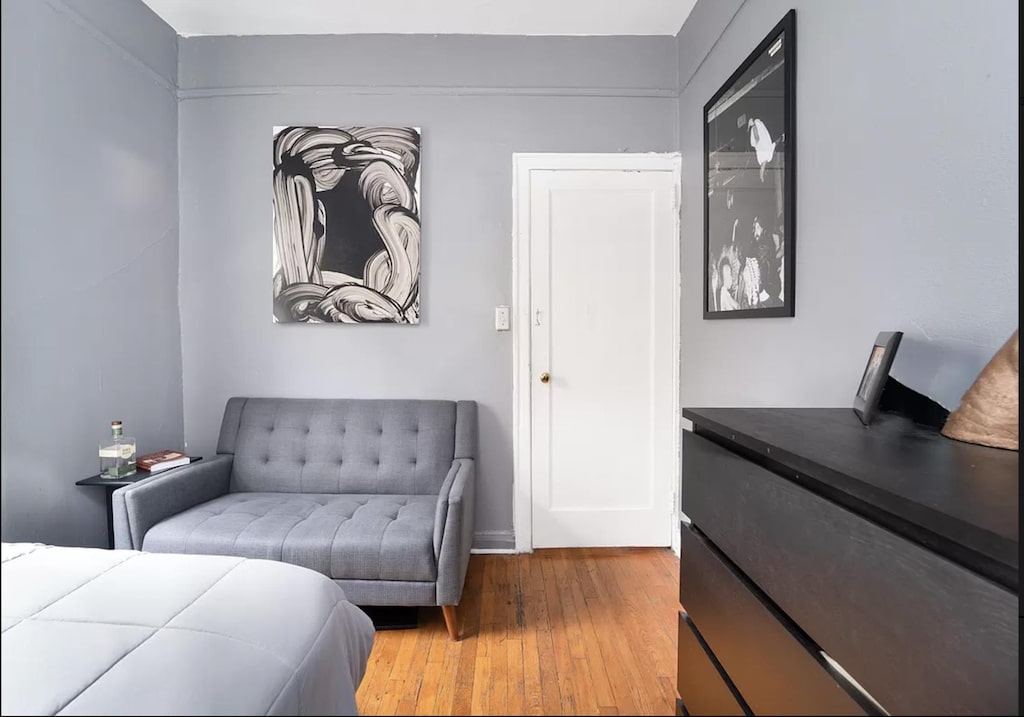 bedroom with light wood-type flooring