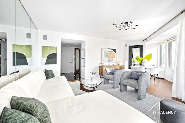 150 W 56th St Unit 5603, New York City, NY 10019 - living room with wood finished floors and baseboards