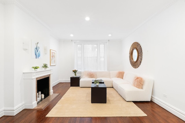 850 Park Ave Unit 1Dr, New York City, NY 10075 - living room with wood finished floors, ornamental molding, recessed lighting, baseboards, and a fireplace with raised hearth
