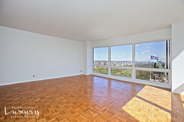 empty room featuring parquet floors