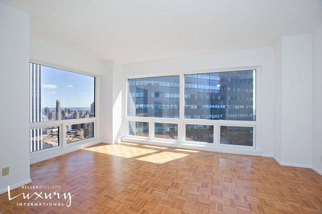 721 5th Ave Unit 52D, New York City, NY 10022 - unfurnished room with baseboards