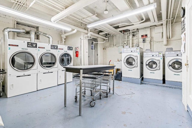 common laundry area with washer and clothes dryer