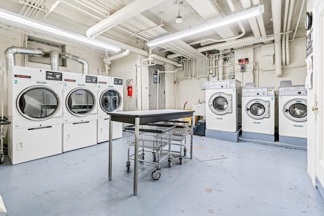 community laundry featuring independent washer and dryer