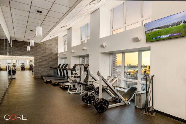 gym with a drop ceiling