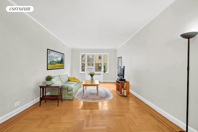 living area with radiator heating unit, crown molding, and light parquet floors