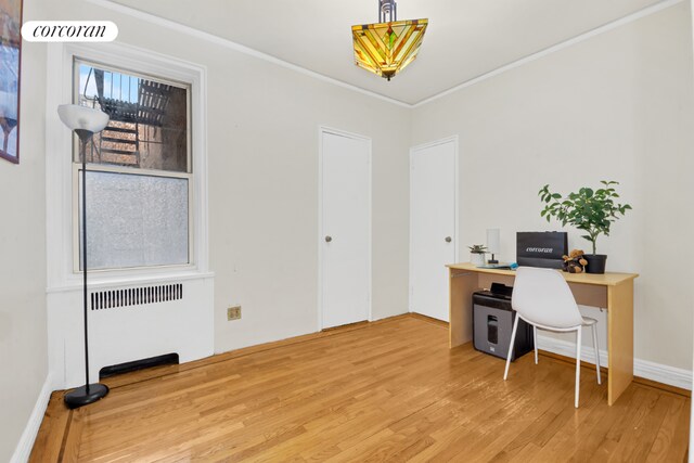 bedroom featuring cooling unit and hardwood / wood-style floors